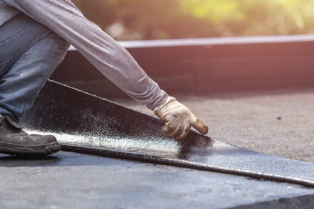 Professional Basement Waterproofing technician working in Annandale, MN
